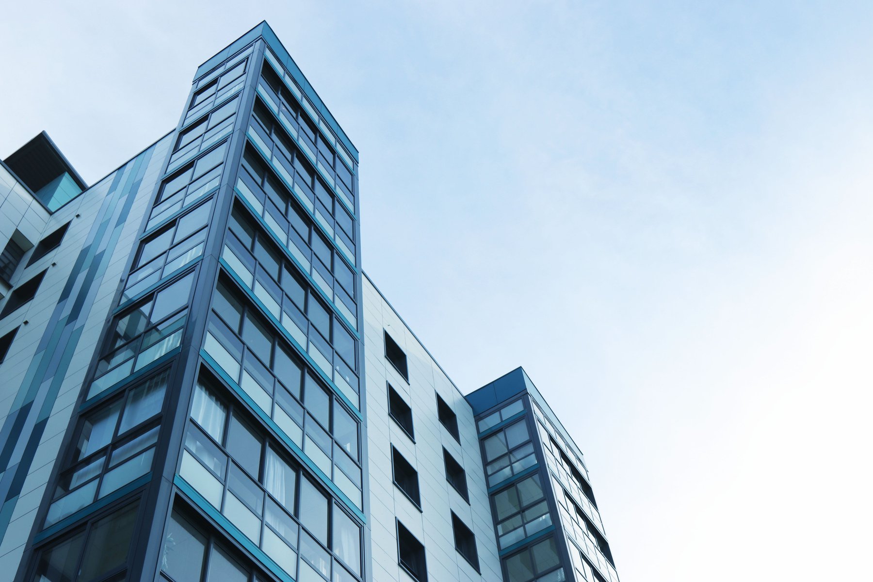 Low Angle View of Office Building Against Sky